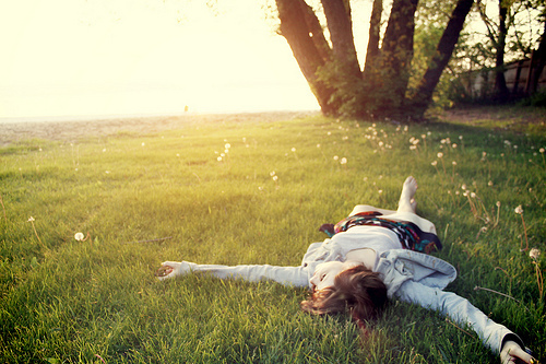 lying in grass